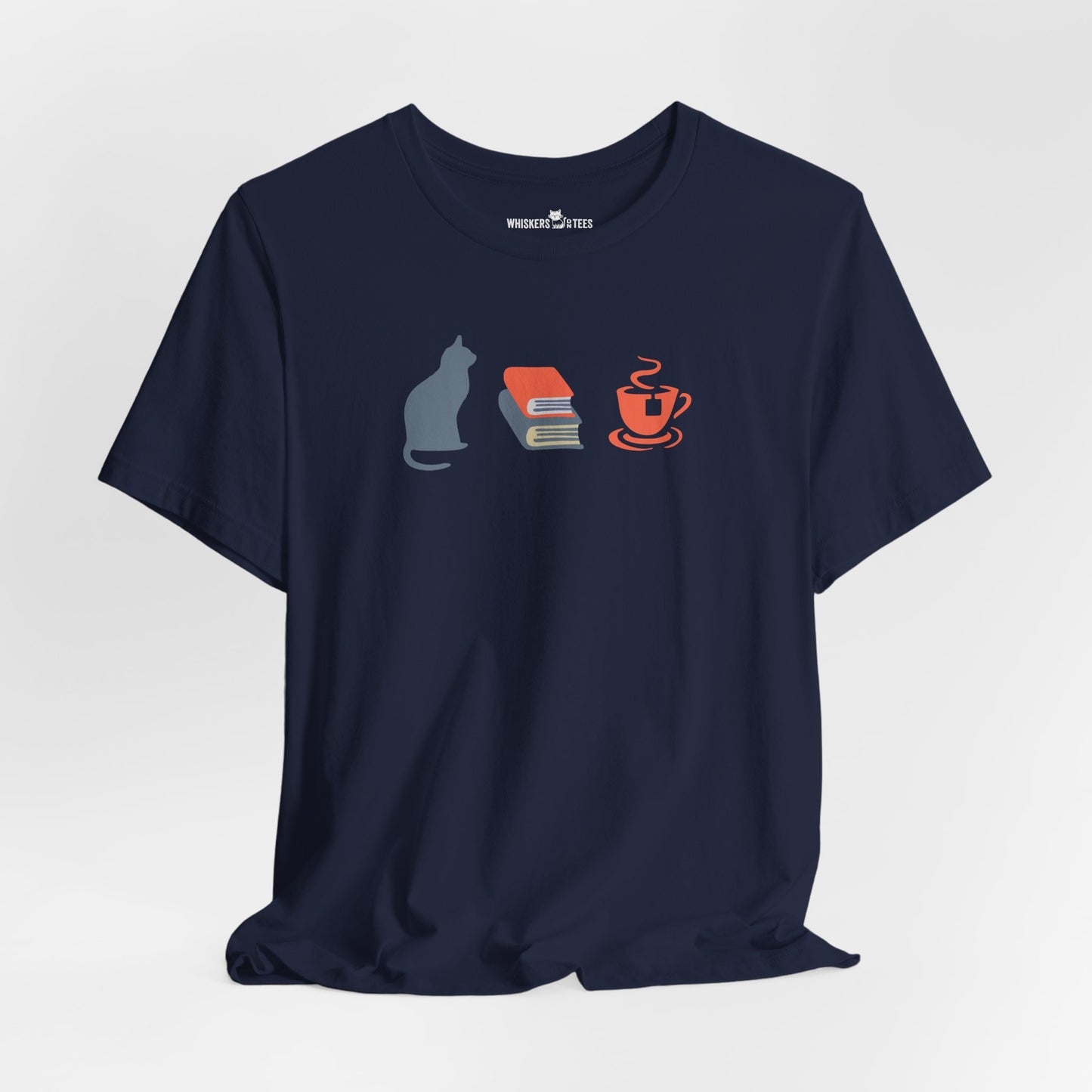 navy blue graphic tee showing a powder-blue cat, orange and blue books, and orange tea cup