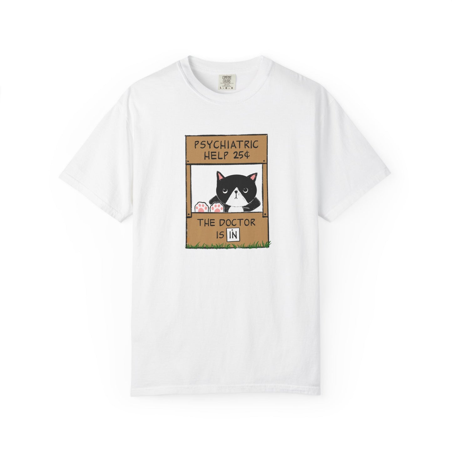 a white t-shirt with a graphic of a cat with feet up on the counter of a booth showing signs reading "Psychiatric Help 25 cents" and "The Doctor is IN"