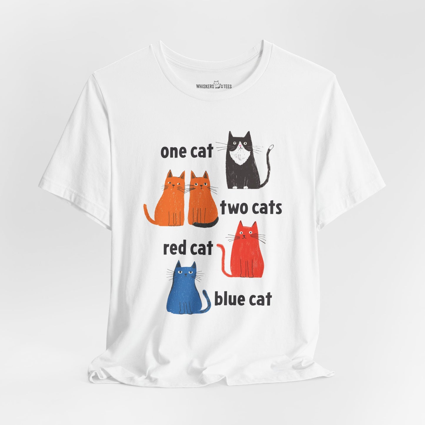 a white graphic t-shirt featuring one tuxedo cat, two orange cats, one red cat, and one blue cat