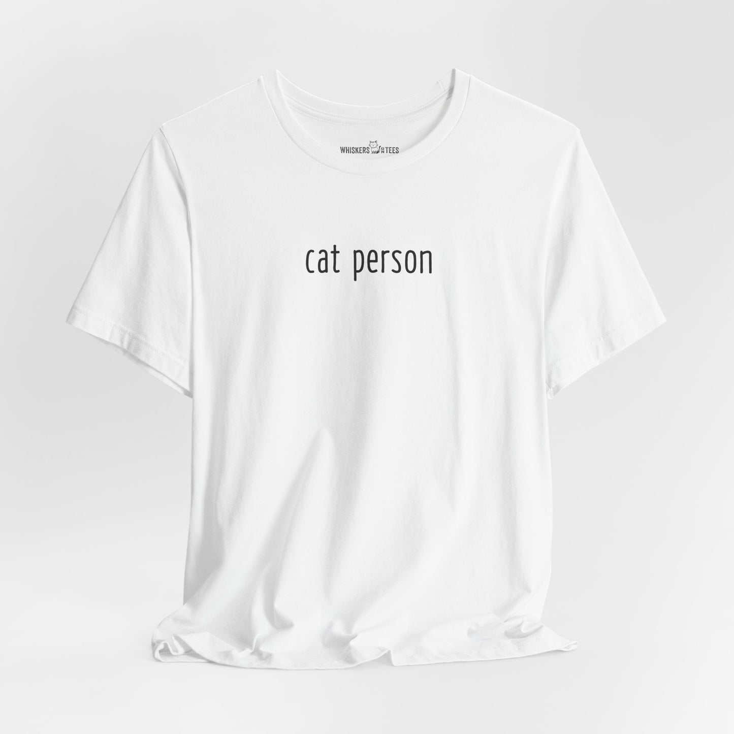 a white t-shirt with words 'cat person' printed in black