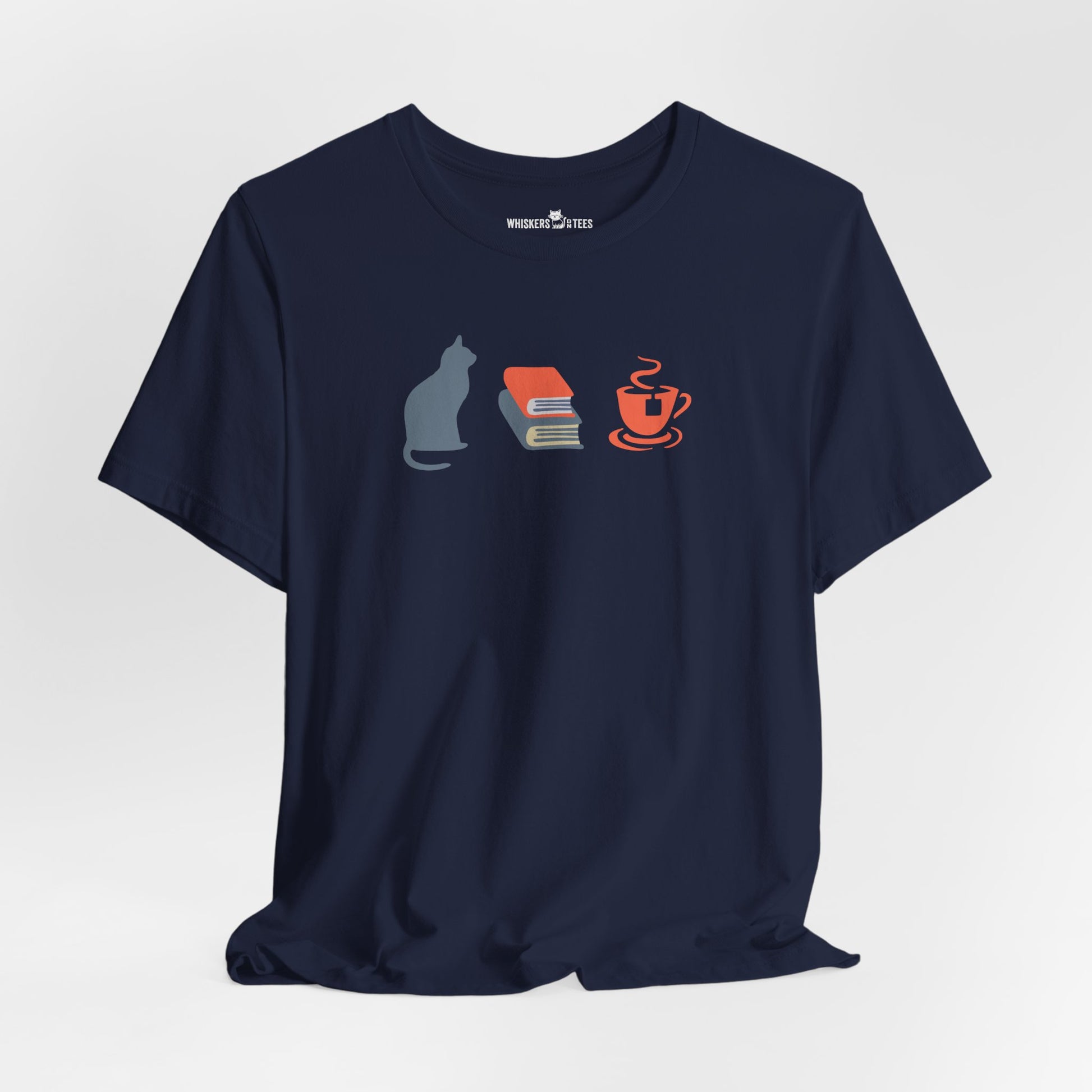 navy blue graphic tee showing a powder-blue cat, orange and blue books, and orange tea cup
