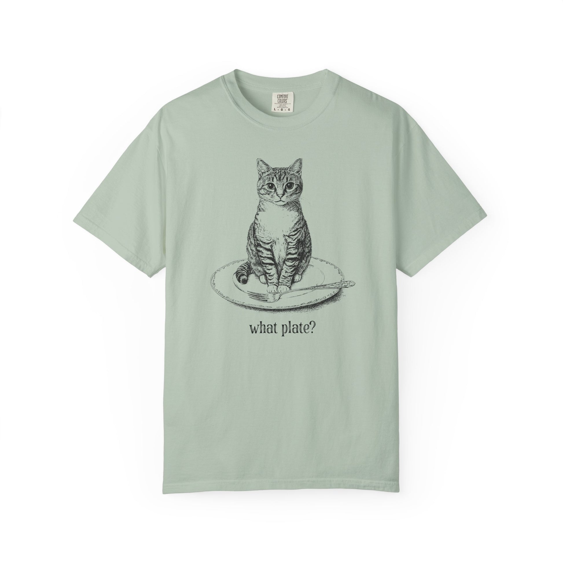 a sage green t-shirt with a detailed drawing of a cat on a dinner plate with fork, with text "What Plate?"